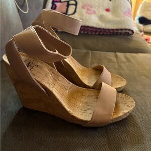 Woman’s tan sandal wedge  size 8